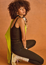 THE UPSIDE women's olive jacquard Castilla 25 Inch Midi Pant is designed for a soft and comfortable fit and features mid-rise with lime elastic drawcord. Made for yoga and pilates.