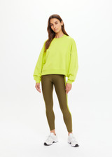 THE UPSIDE women's green organic cotton Paloma Crew is designed for a boxy fit and features a drop shoulder with ribbed neckline, cuffs, and hem. Made for lifestyle.