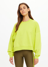 THE UPSIDE women's green organic cotton Paloma Crew is designed for a boxy fit and features a drop shoulder with ribbed neckline, cuffs, and hem. Made for lifestyle.