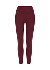 THE UPSIDE women's maroon recycled peached 25 Inch Legging is designed for a soft and supportive fit and features a mid-rise and moisture-wicking. Made for yoga and pilates.
