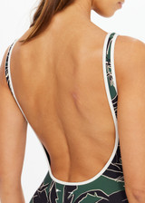 THE UPSIDE women's floral Tamara Scoop One Piece is a soft and comfortable fit, featuring contrast cream binds and a shaped legline. Made for swim.