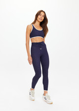THE UPSIDE women's polka dot Spellbound Jade Racerback Bra is supportive and comfortable with removable cups and contrast cream bindings. Made for yoga & pilates.