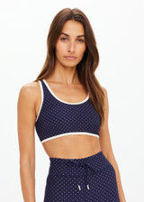 THE UPSIDE women's polka dot Spellbound Jade Racerback Bra is supportive and comfortable with removable cups and contrast cream bindings. Made for yoga & pilates.
