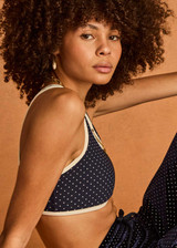 THE UPSIDE women's polka dot Spellbound Jade Racerback Bra is supportive and comfortable with removable cups and contrast cream bindings. Made for yoga & pilates.