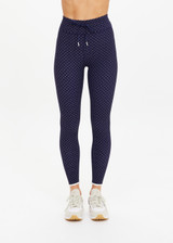 THE UPSIDE women's polka dot Spellbound 25inch Legging is supportive and comfortable with recycled rib fabric, elastic drawcord, and cream aglet ends. Made for yoga & pilates.