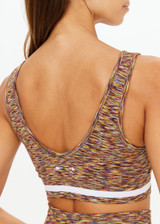 THE UPSIDE women's multi coloured spacedye Seamless Daisy Bra offers a supportive & comfortable fit, featuring a scooped neckline and white striped ribbed underbust. Made for yoga & pilates.