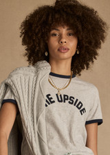THE UPSIDE women's grey organic cotton Jarama Joy Tee features contrast navy binds on neck and sleeves and The Upside logo on front chest. Made for everyday leisure.