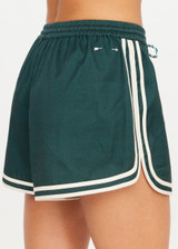 THE UPSIDE women's green Klio Short is designed for a mid-rise, relaxed fit and features a soft elasticated waistband with drawcord and contrast binds in cream along curved hem. Made for everyday.