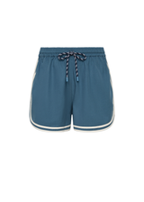 THE UPSIDE women's blue Klio Short is designed for a mid-rise, relaxed fit and features a soft elasticated waistband with drawcord and contrast binds in cream along curved hem. Made for everyday.