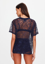THE UPSIDE women's navy Memento Lace Sammi Tee is designed to be sheer, oversized and can be paired with the Capri Bra for coverage. Made for lifestyle.