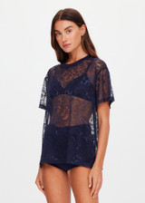 THE UPSIDE women's navy Memento Lace Sammi Tee is designed to be sheer, oversized and can be paired with the Capri Bra for coverage. Made for lifestyle.