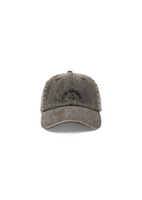 THE UPSIDE women's black Cosmic Washed Denim Soft Cap features a horseshoe logo at front and an adjustable strap at back.