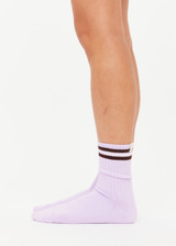 THE UPSIDE women's lilac purple Miami Crew Sock features jacquard stripes in chocolate and cream, with logo pip at edge. Made for lifestyle.