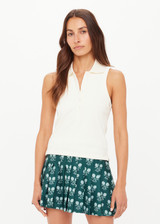 THE UPSIDE women's cream Courtship Henri Collared Top is made in moisture wicking, rib performance fabric and features a ribbed collar and buttons on front neckline. Made for tennis, gold & pickleball.
