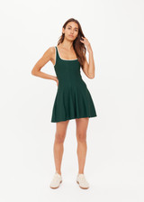 THE UPSIDE women's green recycled soft peached Racquet Maxine Mini Dress features a square neckline with contrast cream binds, an internal shelf bra and built-in shorts with pockets. Made for tennis, golf & pickleball.