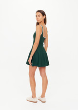 THE UPSIDE women's green recycled soft peached Racquet Maxine Mini Dress features a square neckline with contrast cream binds, an internal shelf bra and built-in shorts with pockets. Made for tennis, golf & pickleball.