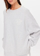 THE UPSIDE women's grey organic cotton Racquet Coolum Crew is an oversized fit with small split at side hem and discreet side pockets. Made for tennis, golf & pickleball.