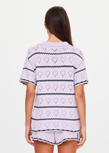 THE UPSIDE women's lilac organic cotton Amara Amayah Knit Shirt is a relaxed fit and features an open knit heart design and pearlised shell buttons. Made for tennis, golf & pickleball.