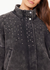 THE UPSIDE women's washed black Cosmic Carmen Moto Jacket is designed for a relaxed fit and features silver meta snap buttons, welt pockets and a soft elasticated hem. Perfect everyday outerwear piece.
