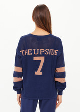 THE UPSIDE women's navy organic cotton Fenway Sebastian Crew offers a relaxed fit and features The Upside logo knit detail on back in tan. Made for lifestyle.