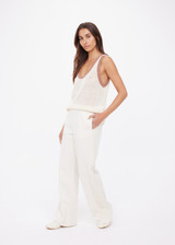 THE UPSIDE women's cream Navar Marnie Wide Leg Pant is a high-rise wide leg fit in our castilla "TU" design and features an elasticated waistband and side seam pockets. Made for everyday wear.