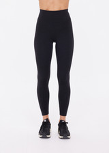 THE UPSIDE women's black recycled jacquard Castilla 25inch Legging is high-rise with a V panel waistband. Made for yoga & pilates.