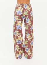 THE UPSIDE women's floral Isla Juliet Pant offers a relaxed fit in our vintage Isla hibiscus design and features an elasticated waistband with pockets, a split hem detail and yellow contrast binds. Made for lifestyle.