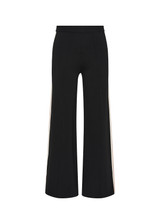 THE UPSIDE women's black Freya Knit Pant has a straight leg fit and features an elasticated waistband  and short splits at hem. Made for lifestyle.