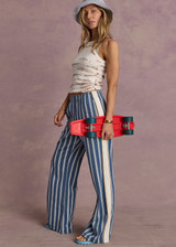 THE UPSIDE women's blue stripe Palmas Marnie Wide Leg Pant offers a high-rise, wide leg fit and features an elasticated waistband and side pockets. Made for lifestyle.