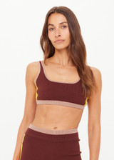 THE UPSIDE women's brown Montage Rory Scoop Knit Sports Bra features a scooped neckline with mid coverage and yellow side pannels. Made for yoga & pilates.