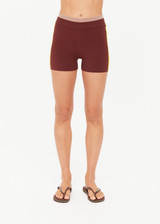 THE UPSIDE women's brown Montage Speechless Short offers a mid-rise fit with a soft waistband and features yellow side pannels, embroidered and rib detail. Made for yoga & pilates.