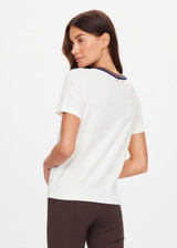 THE UPSIDE women's cream organic cotton Zahra Rib Tee features a rib fabrication and striped neckline in navy and tan. Made for lifestyle.
