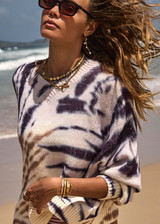 THE UPSIDE women's tie dye organic cotton Westwood Millie Knit Sweater offers a relaxed fit featuring a high V neckline and colourful design on a cream base. Made for lifestyle.