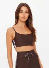 THE UPSIDE women's brown eco tech Oxford Hutton Scoop Sports Bra offers a mid coverage shelf bra with removable cups and adjustable straps. Designed with lilac coloured binds down the side. Made for high impact.