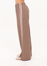 THE UPSIDE women's brown Juliet Pant features a lightweight,  low-rise design with an elasticated waist band, side seam pockets and cream contrast binds. Made for everyday wear.