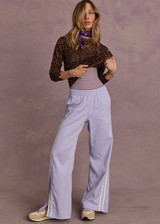 THE UPSIDE women's lilac Juliet Pant features a low-rise with side stripes, an elasticated waist, side seam pockets and split hem detail. Made for lifestyle.