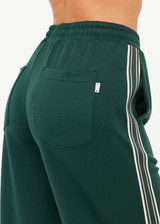 THE UPSIDE women's green Roma Pant is a highwaisted, true-to-size fit made in double-faced jersey and features contrast tape down side seams, side pockets and an elasticated waistband with drawcord.