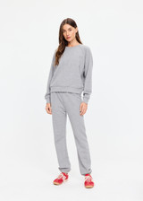 THE UPSIDE women's grey cotton Hit The Road Track Top is a relaxed raglan crew neck sweater in french terry fabrication with a ribbed neckline, arms and cuffs. Made for lifestyle.