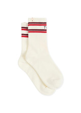 THE UPSIDE women's cream Two Hearts Crew Sock features jacquard stripes in red and burgundy and two black hearts on the ankle. Made for lifestyle.