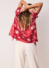 THE UPSIDE women's red  Dusty's Holiday Shirt is a short sleeve button-up in our holiday red and cream printed design and features a patch pocket on front chest. Made for lifestyle.