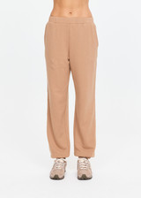 THE UPSIDE women's brown organic cotton Marlon Harrison Track Pant is true-to-size and features side stripes, side seam pockets and elasticated cuffs. Made for lifestyle.