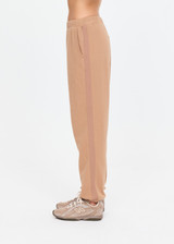 THE UPSIDE women's brown organic cotton Marlon Harrison Track Pant is true-to-size and features side stripes, side seam pockets and elasticated cuffs. Made for lifestyle.