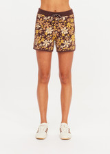 THE UPSIDE women's floral organic cotton Copacabana Leon Knit Short features a soft and supportive fit, side stripes, zip pockets and a drawcord waistband. Made for lifestyle.