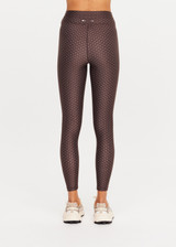 THE UPSIDE women's geo recycled supersoft Poet 25inch Midi Legging features a soft and supportive fit, mid rise waist, adjustable drawcord and signature geo print. Made for yoga and pilates.