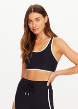 THE UPSIDE women's black Sol Jade Racerback Sports Bra is designed for a soft and supportive fit and features a scooped racerback, contrast binding and removable cups. Made for yoga and pilates.