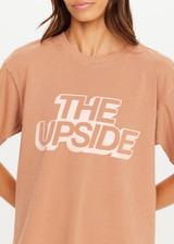 THE UPSIDE women’s brown 100% organic cotton Jacob Tee is designed for an oversized fit and features a ribbed collar and printed logo detail. Made for lifestyle.