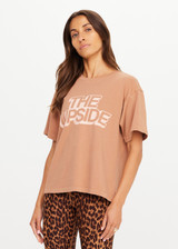 THE UPSIDE women’s brown 100% organic cotton Jacob Tee is designed for an oversized fit and features a ribbed collar and printed logo detail. Made for lifestyle.