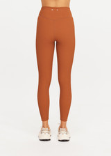 THE UPSIDE women’s brown recycled jacquard Mariana 25inch High Midi Legging offers a soft and supportive fit and features a high rise waist and V panel waistband. Made for yoga and pilates.