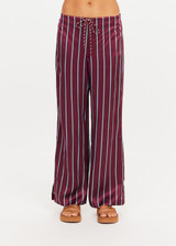 THE UPSIDE women’s stripe 100% silk Capela Charli Drawstring Pant is a low rise straight leg pant and features a soft elastic waistband, side hem splits and drawcord detail. Made for lifestyle.