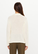 THE UPSIDE women's cream organic cotton Frederica Knit Top is designed for a relaxed fit with an open geometric knit construction, collared neckline and abalone shell button detailing. Made for lifestyle.
